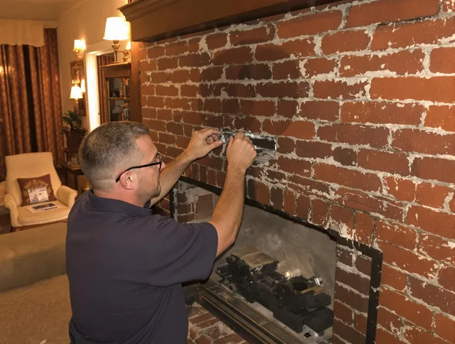 New Fairfield Chimney Sweep expert fixing a fireplace in New Fairfield, CT